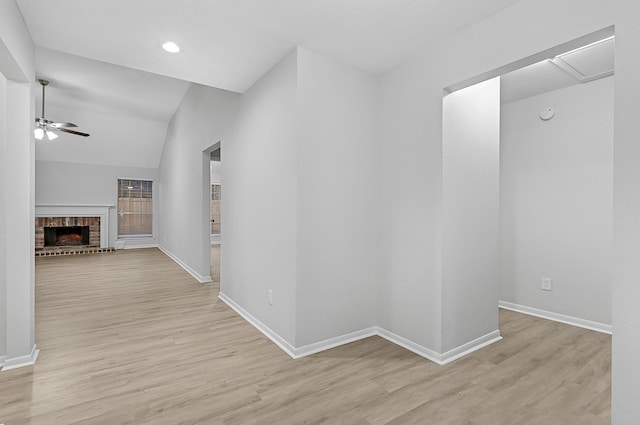 hallway with light hardwood / wood-style floors