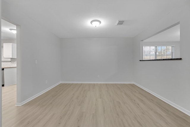 empty room featuring light hardwood / wood-style floors