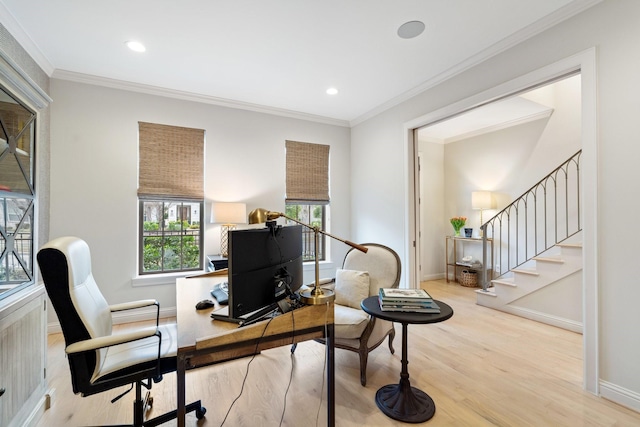 office featuring ornamental molding and light hardwood / wood-style flooring