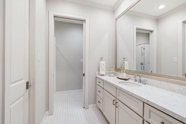 bathroom with a shower with door, crown molding, and vanity