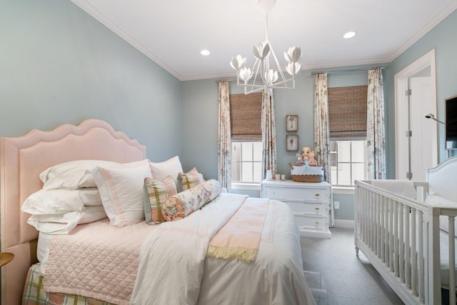 bedroom with crown molding, a chandelier, and carpet