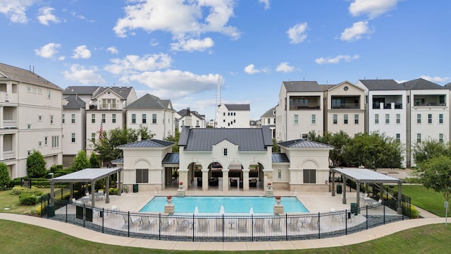 view of swimming pool with a gazebo and a patio area