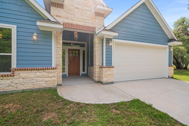 entrance to property featuring a garage