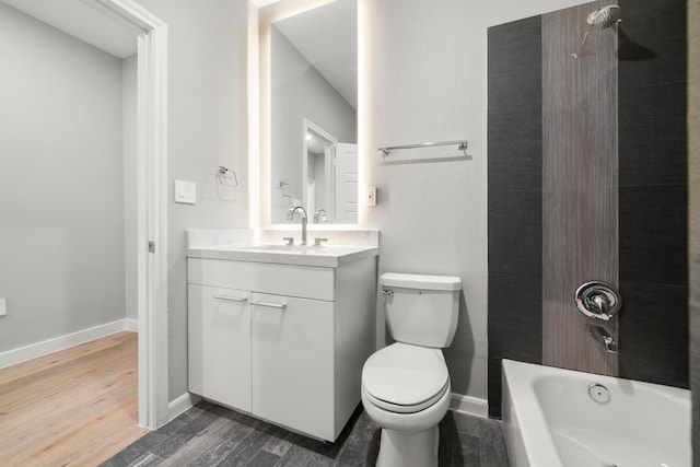 full bathroom featuring vanity, toilet, shower / bath combination, and hardwood / wood-style floors