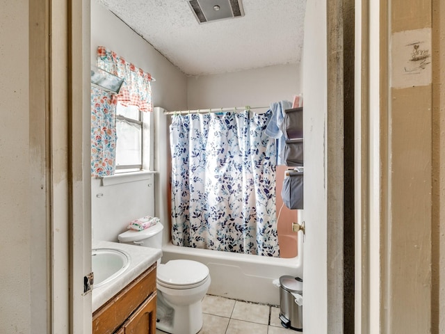 full bathroom with shower / bath combination with curtain, tile patterned flooring, vanity, toilet, and a textured ceiling