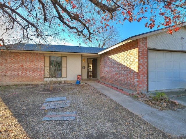 property entrance featuring a garage