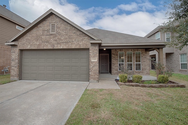 view of front of home with a garage, a porch, and a front lawn