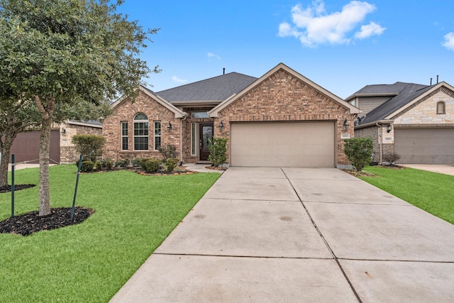 ranch-style house with a garage and a front yard