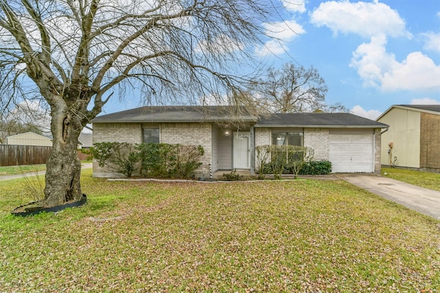 ranch-style home with a garage and a front lawn