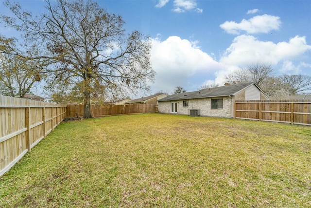 view of yard featuring central AC