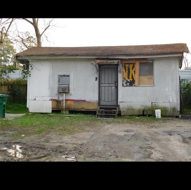 view of front of house with cooling unit