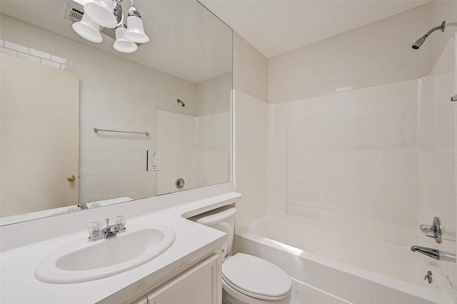 full bathroom featuring shower / bathtub combination, vanity, and toilet