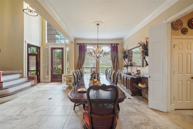 tiled dining area featuring an inviting chandelier and ornamental molding