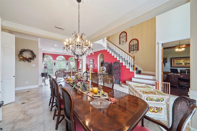 dining space with an inviting chandelier and ornamental molding