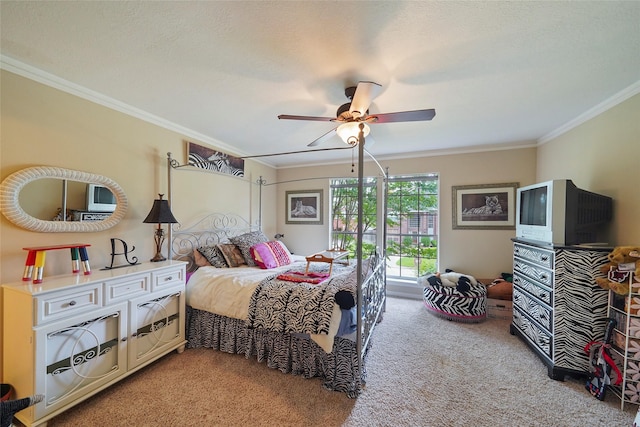 bedroom featuring a textured ceiling, ornamental molding, ceiling fan, and carpet