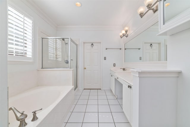 bathroom featuring vanity, tile patterned floors, ornamental molding, and independent shower and bath