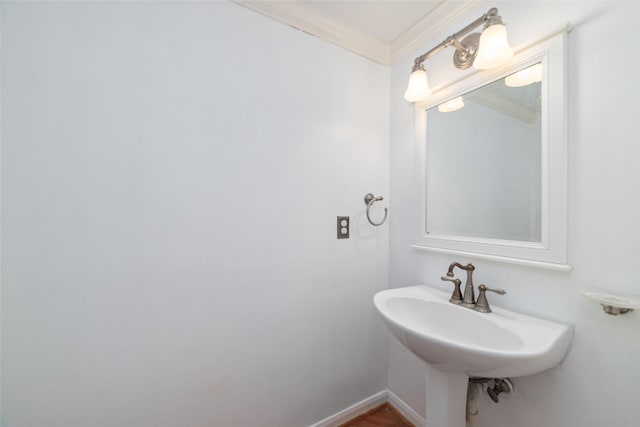 bathroom with crown molding