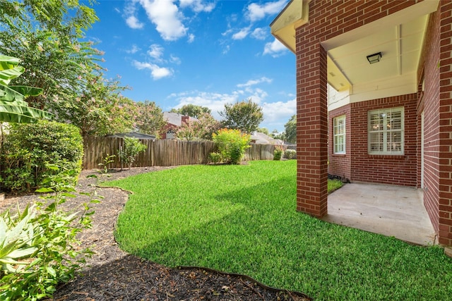 view of yard with a patio area