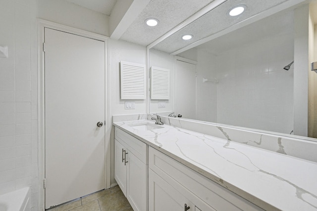 bathroom featuring vanity and tile patterned flooring