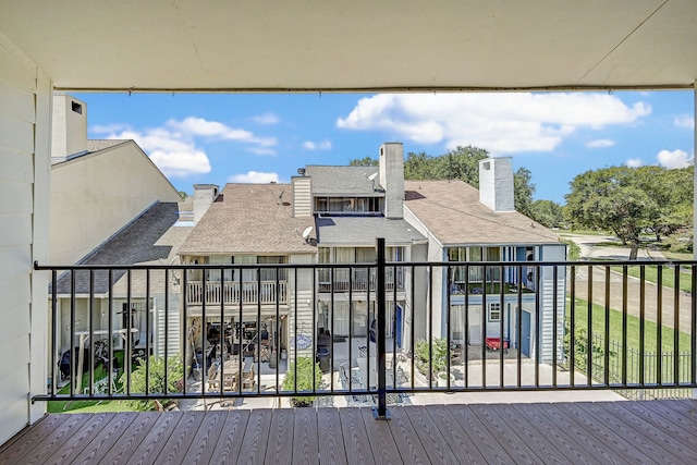 2022 Lakewood Ct, Willis, TX 77318 - wooden deck featuring a residential view
