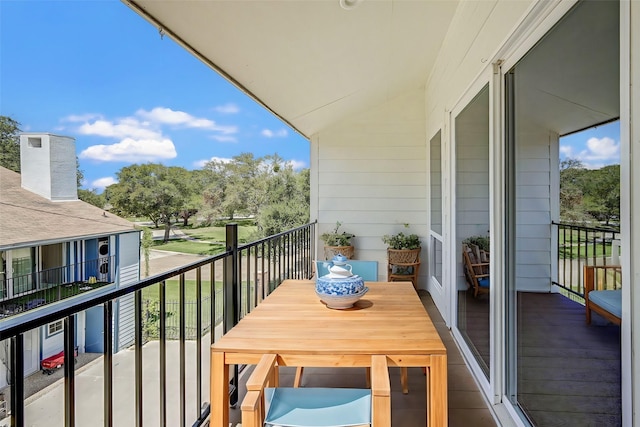 balcony featuring a sunroom