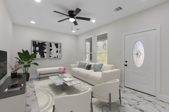 living area featuring marble finish floor, a ceiling fan, visible vents, and recessed lighting