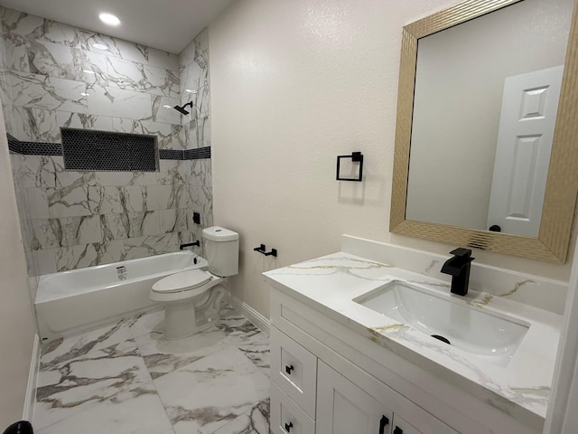 full bathroom featuring tiled shower / bath, vanity, and toilet