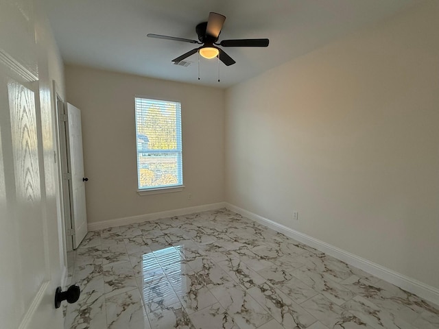 empty room featuring ceiling fan