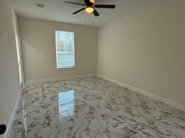 unfurnished room featuring ceiling fan