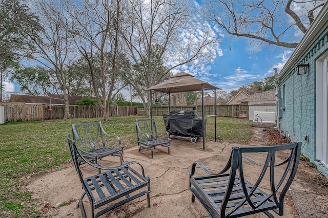 view of patio / terrace featuring a gazebo and area for grilling