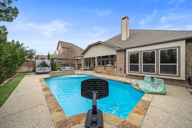 view of pool with a patio