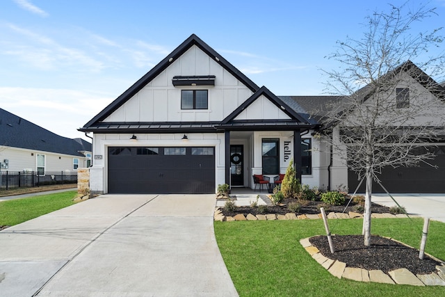 modern farmhouse style home featuring a front yard