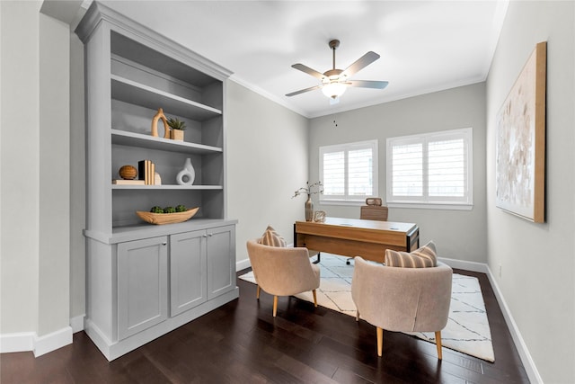 office with crown molding, ceiling fan, dark hardwood / wood-style floors, and built in features