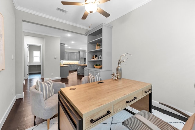 home office featuring ornamental molding, dark hardwood / wood-style floors, and ceiling fan