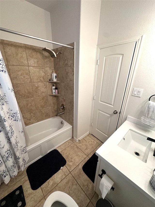 full bathroom with shower / bath combination with curtain, vanity, toilet, and tile patterned flooring