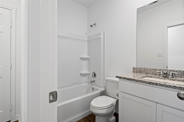 full bathroom featuring shower / bathtub combination, vanity, and toilet