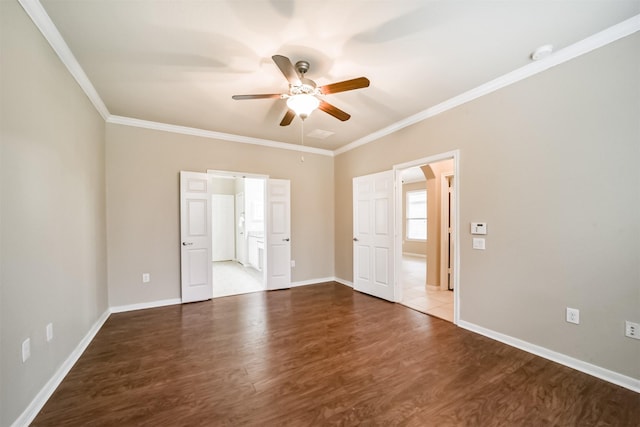 unfurnished room with wood-type flooring, ornamental molding, and ceiling fan