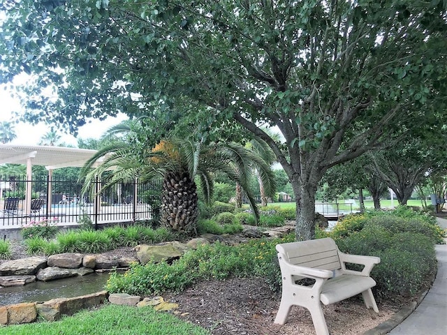 view of community featuring a pergola