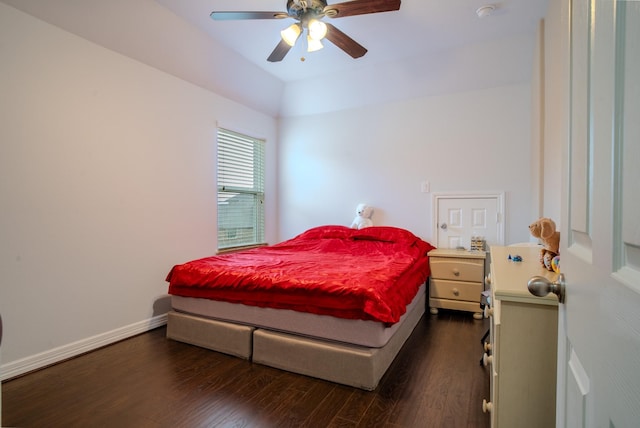 bedroom with dark wood-type flooring and ceiling fan