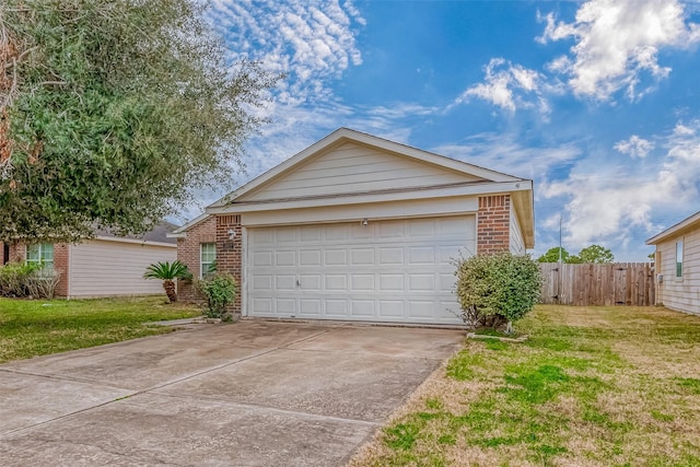 view of front of home with a garage and a front yard