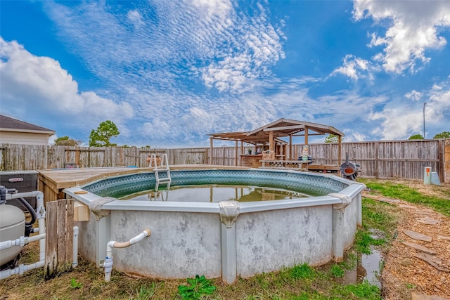 view of swimming pool featuring a gazebo