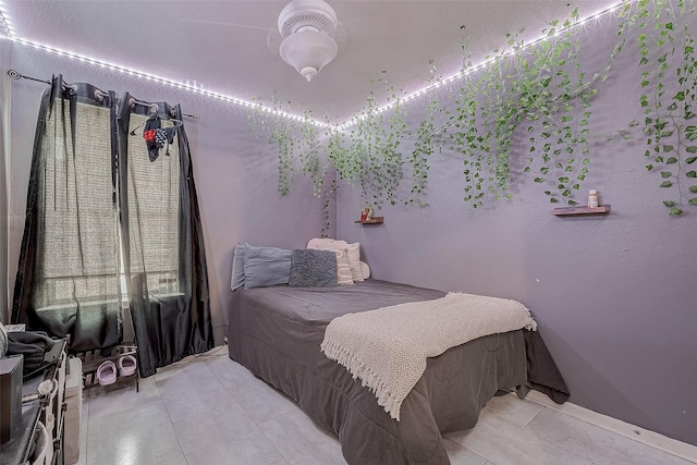 bedroom featuring light tile patterned floors