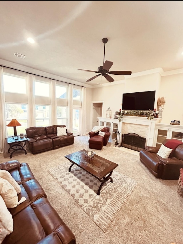 living room with recessed lighting, visible vents, carpet floors, crown molding, and ceiling fan