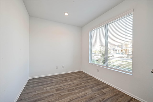 empty room featuring dark hardwood / wood-style floors