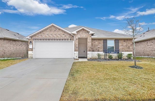 ranch-style house featuring a garage and a front lawn