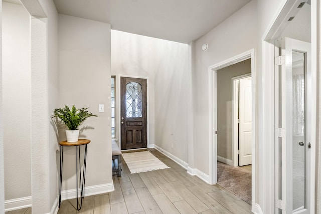 foyer entrance featuring light wood-type flooring