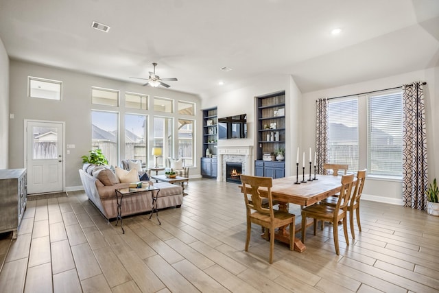 dining room featuring ceiling fan and light hardwood / wood-style flooring