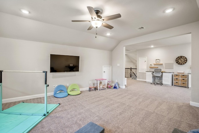 rec room with lofted ceiling, ceiling fan, and carpet flooring