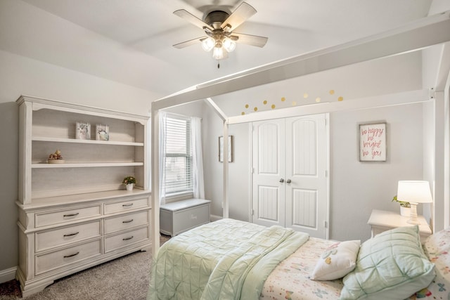 bedroom with light colored carpet, a closet, and ceiling fan