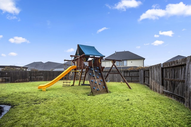 view of playground featuring a yard